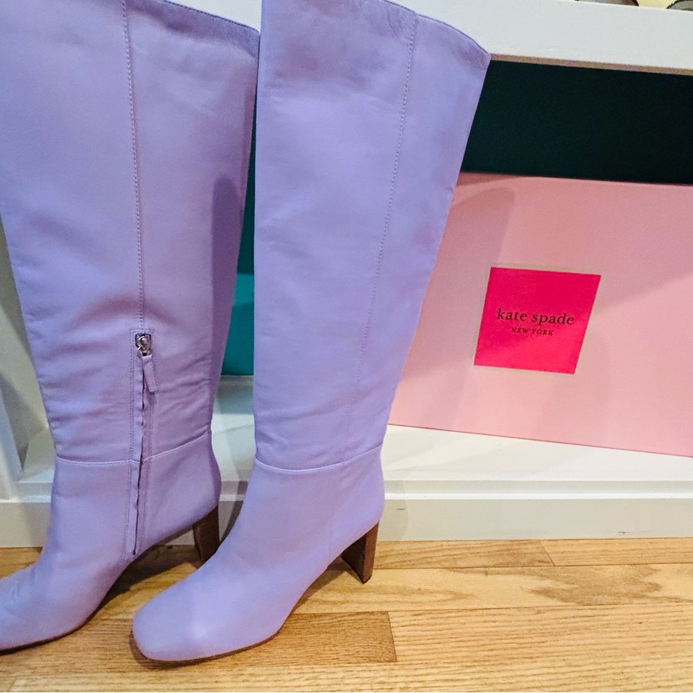 Brand new never worn pair of high-heel boots in frozen lilac.  Size 9.5.